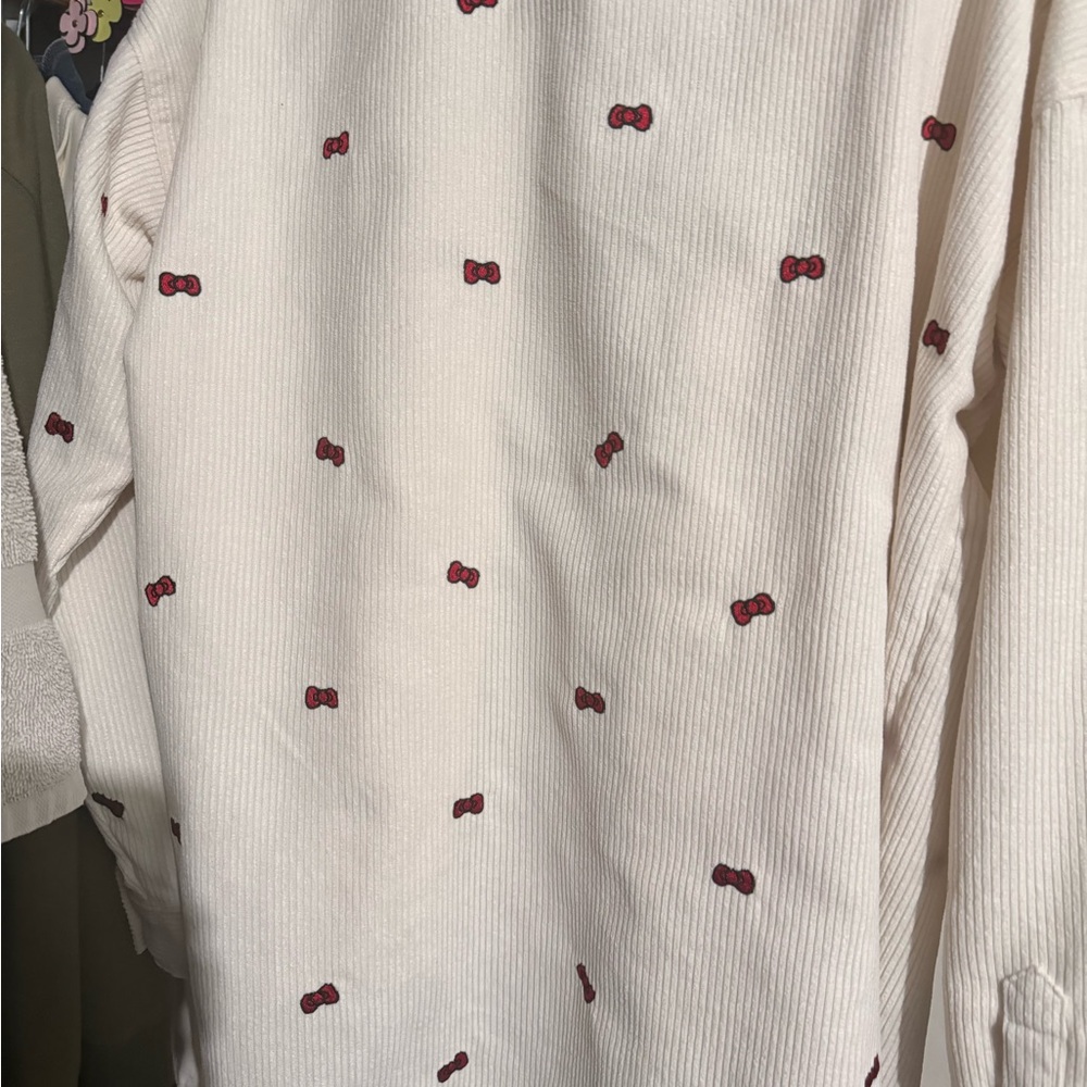 White Shacket with Red Bow Accents